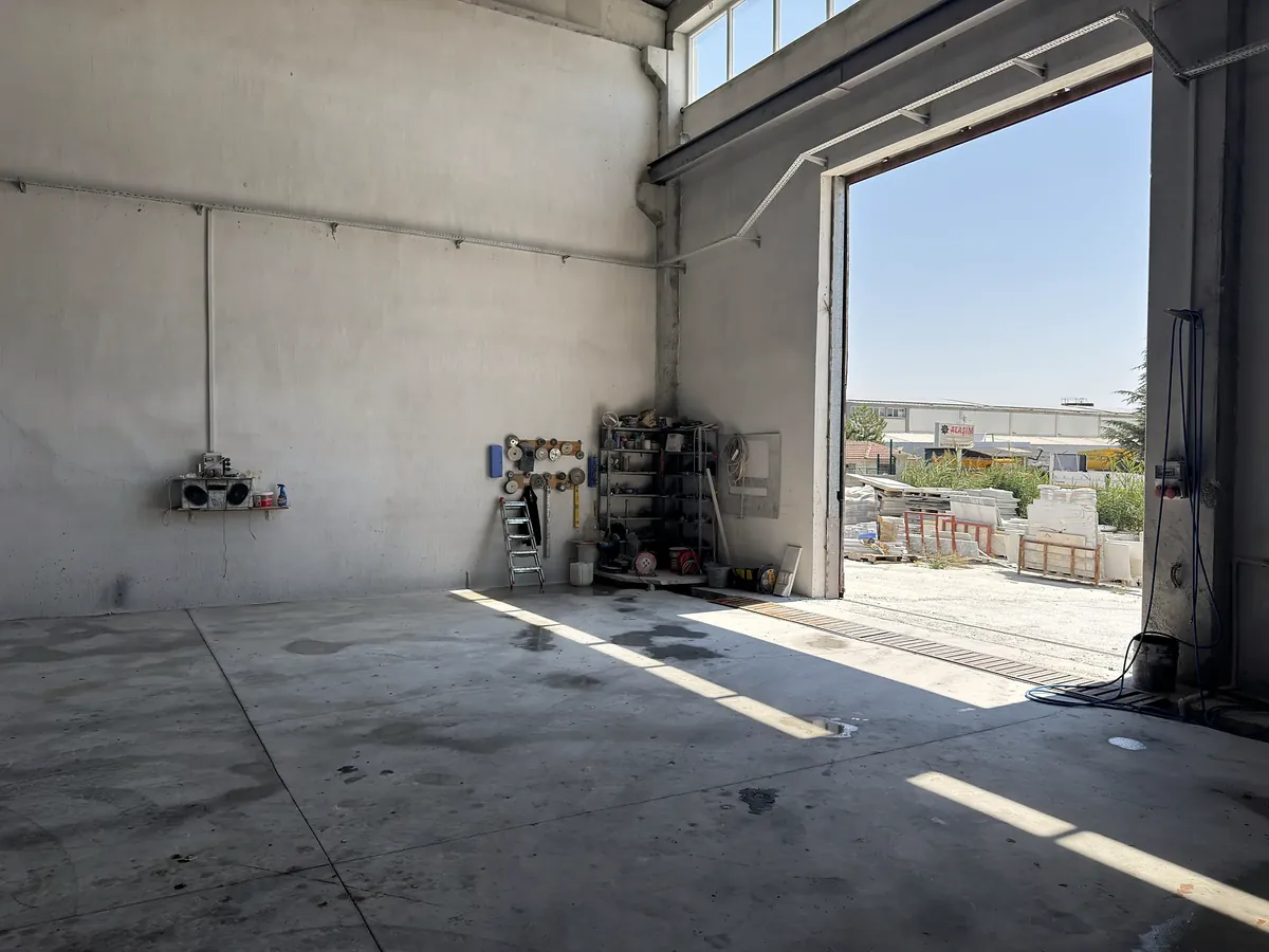 The open stock yard seen through the hall door